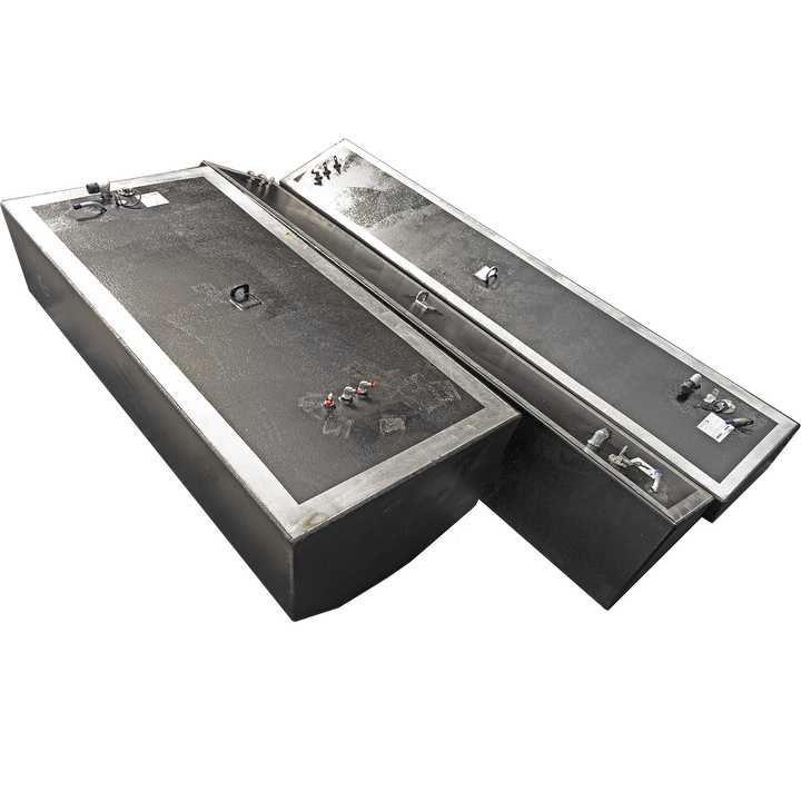 Three boat fuel tanks, one large and two smaller, are presented on a checkerboard background. The tanks are black with silver trim, and their top surfaces feature various fittings and connections. The large tank is in the foreground, angled towards the viewer, while the two smaller, elongated tanks are positioned behind it, also at an angle. The image suggests a combination of fuel tanks for a boat