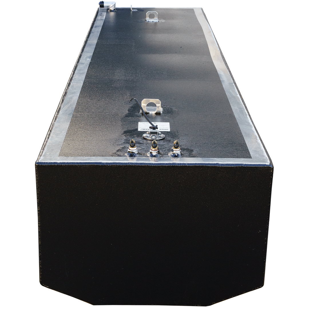 A black, rectangular Jefferson Yachts Maralago 35' 1997 - 241 gal. OEM Replacement Fuel Tank is shown from an elevated perspective against a checkerboard transparent background. The tank has a textured top surface with a lighter gray border. Various metal fittings are visible, including three brass-colored connectors, a circular cap with exposed wires, and two eye bolts. The tank has rounded bottom corners
