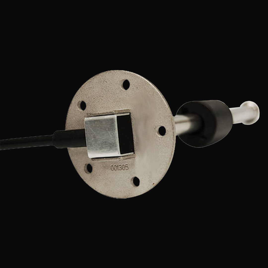 Alt Text: Close-up view of an SSS/SSL sender with a SAE 5 hole pattern mount, featuring a metallic circular base with five holes and a protruding sensor rod