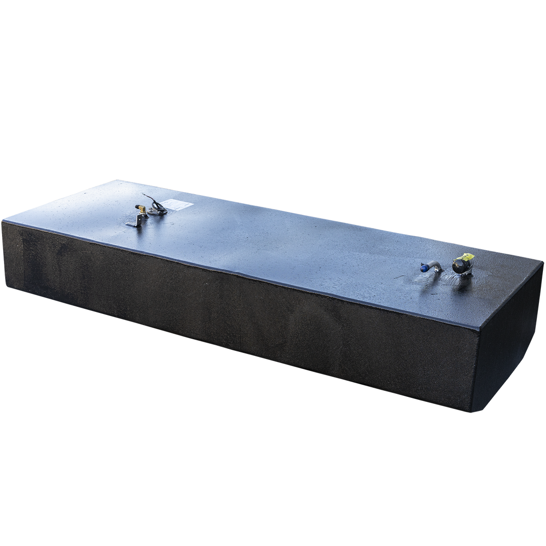 A long, rectangular boat fuel tank with a textured black finish, seen in a three-quarter profile view against a checkered background. The flat top surface has two groups of fittings at opposite ends. At the far end, a fuel sending unit assembly with a wire sits next to a white label. In the foreground at the near end, there is a fuel valve with a yellow handle and a separate fitting with a blue cap