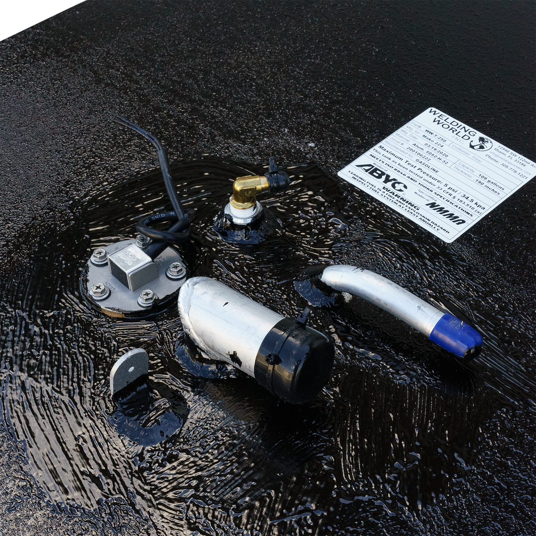 Close-up view of a 1984 Mako 224 OEM replacement fuel tank, featuring fuel fittings and a fuel gauge, with a textured black surface