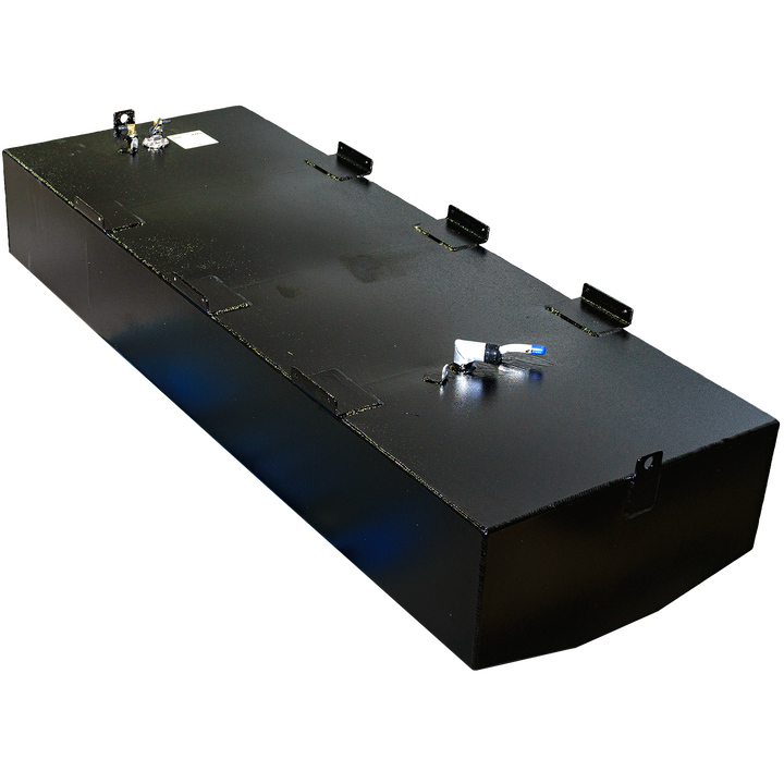A black, rectangular fuel tank with a coarse, textured finish is shown from an elevated perspective. Various metal fittings and mounting brackets are visible on its top surface. The bottom left edge of the tank is rounded. The background is a checkerboard pattern of black and gray squares