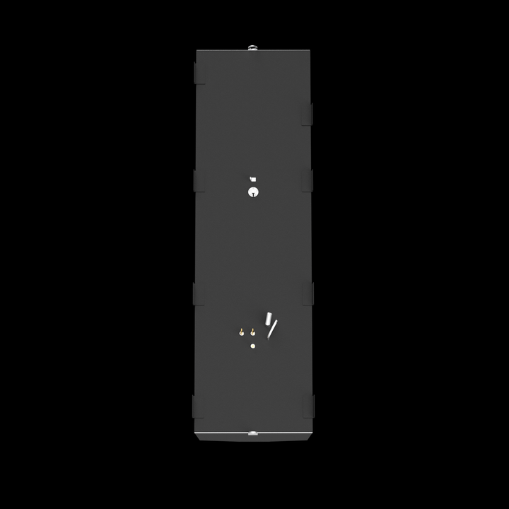 A top-down view of an elongated, dark grey fuel tank against a black background. The tank features a circular opening, several golden-colored fittings, and white pipes on its surface. There are multiple black L-shaped brackets along the side edges, and a silver D-ring at each end