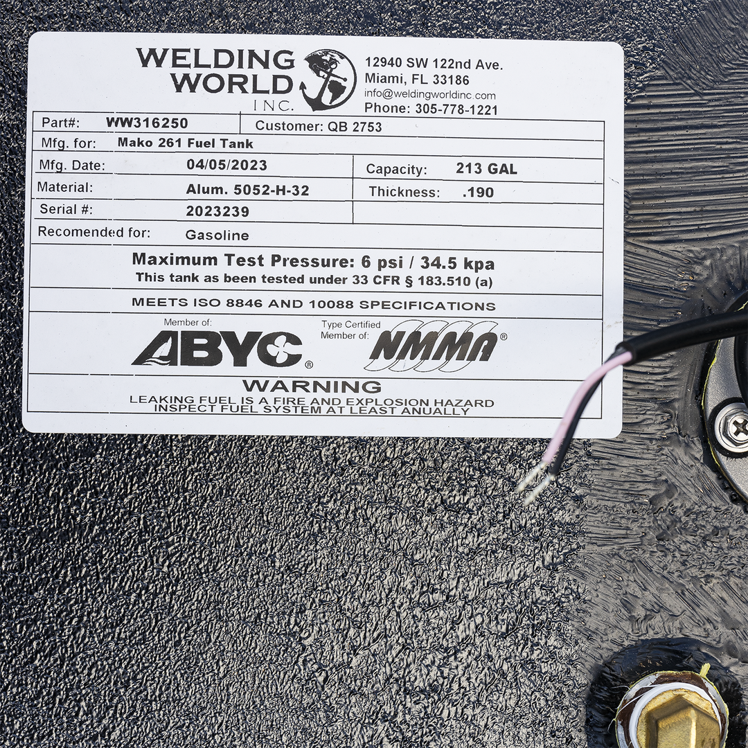 Black rectangular Mako 261 fuel tank with welded brackets along the top edges, multiple fittings and a fuel sending unit on the top surface, textured black finish, photographed at an angle showing the top and two sides