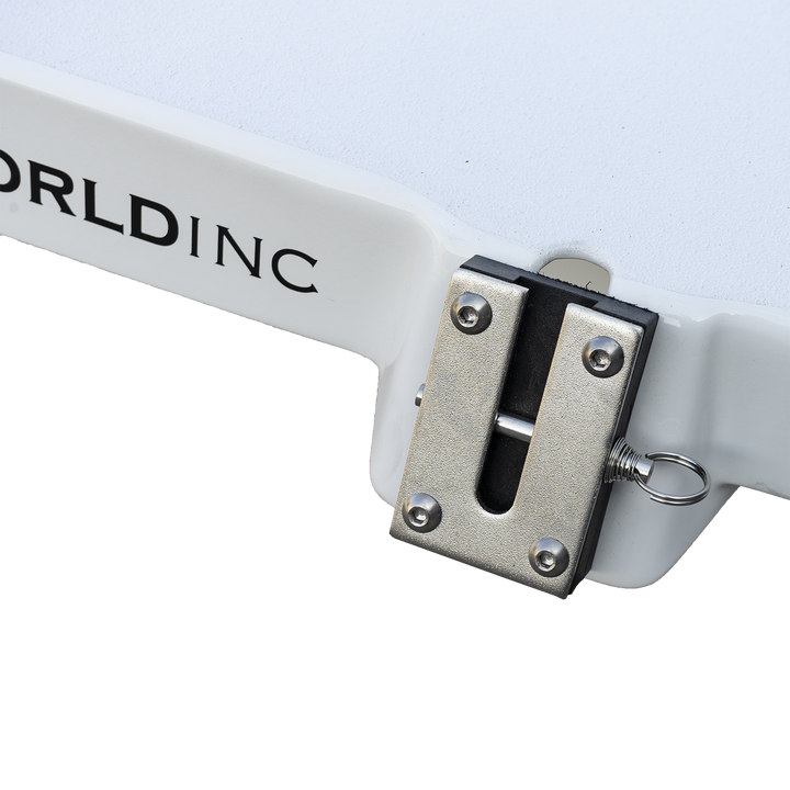 Close-up of a white marine flotation bracket with a metal locking latch and mounting hardware, attached to a white surface. The bracket is part of a boat's engine support system, designed for a Mako 261 1990 model