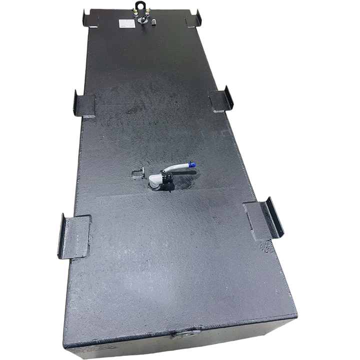 A dark grey, irregularly shaped metal tank with a textured surface is shown from an elevated perspective against a black and grey checkered background. The tank's top features several L-shaped mounting brackets along its edges, and various fittings, including a white, curved pipe with a blue tip, and a cluster of nozzles and a white label at one end. The bottom edge of the tank is slightly curved