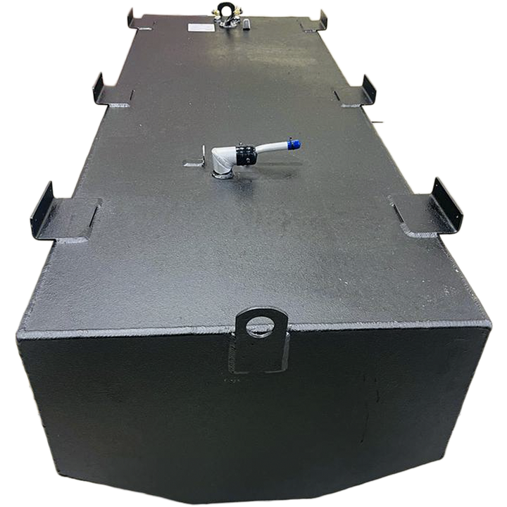 A dark grey, irregularly shaped metal tank with a textured surface is shown from an elevated perspective against a black and grey checkered background. The tank's top features several L-shaped mounting brackets along its edges, and various fittings, including a white, curved pipe with a blue tip, and a cluster of nozzles and a white label at one end. The bottom edge of the tank is slightly curved