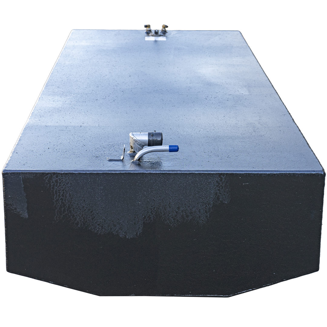 200-gallon aluminum belly fuel tank for the Ocean Master 33, shown with a black matte finish and rectangular profile. Top-mounted features include a capped shutoff valve with a blue handle near the front edge and dual brass fittings positioned toward the rear. Centered on the top surface is a white compliance label confirming .190″ 5052-H32 marine-grade aluminum construction, ABYC/NMMA standards adherence, and 9 psi test certification under 33 CFR § 183.510(a). Layout supports OEM integration, balanced 