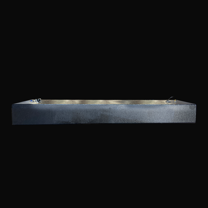 An eye-level studio side profile view displaying the slim 8-inch height and full 96-inch length of a physical, finished black encapsulated Paramount 21 2025 OEM replacement marine fuel tank (84 gal) from file image_c21422.jpg, isolated against a black background. Precision-fabricated from heavy-gauge .190" marine-grade 5052-H32 aluminum, the elongated rectangular hull cell is fully encapsulated in a protective, textured black TarGard epoxy coating to resist severe saltwater pitting and bilge moisture decay.