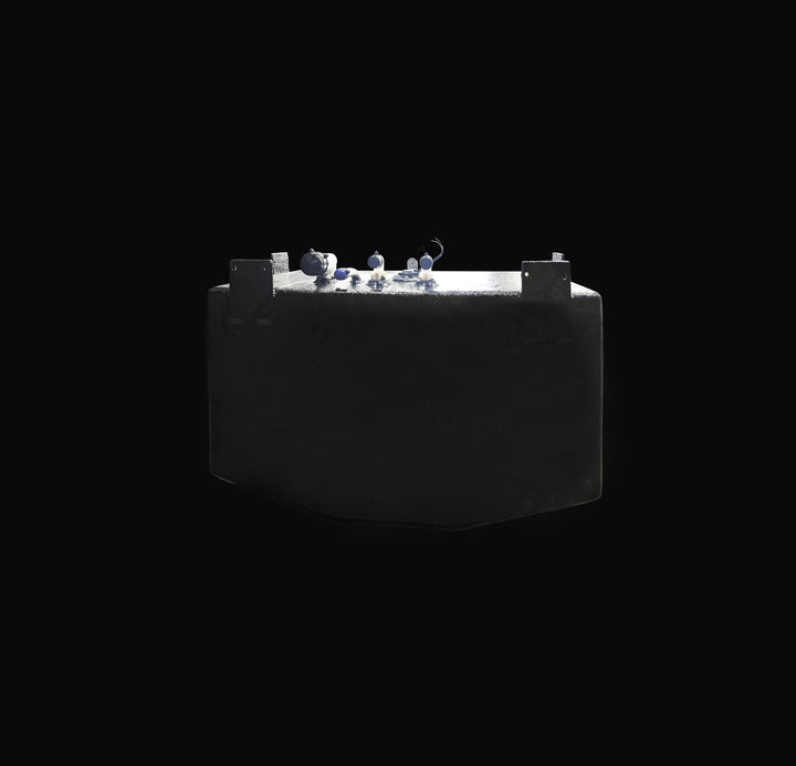 Front-angle profile of a 22-gallon Parker 2301 water tank replacement, highlighting the specialized V-bottom hull-conforming geometry. The image showcases the thick Coal Tar Epoxy protective finish, precision-welded mounting brackets, and top-mounted plumbing ports, ensuring a guaranteed OEM fit and maximum durability for marine fresh water systems.
