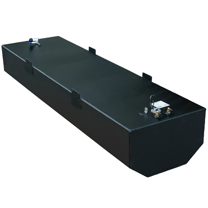 An elevated, angled view of a long, black, rectangular marine fuel tank. The top surface has a textured appearance and features multiple L-shaped black mounting brackets. Towards the left side, a silver-colored angled pipe fitting with a blue cap is visible. On the right side, a circular fitting with wires, two gold-colored nozzles, and a rectangular white label are present. The bottom right corner of the tank is beveled. The image is set against a black and gray checkered background