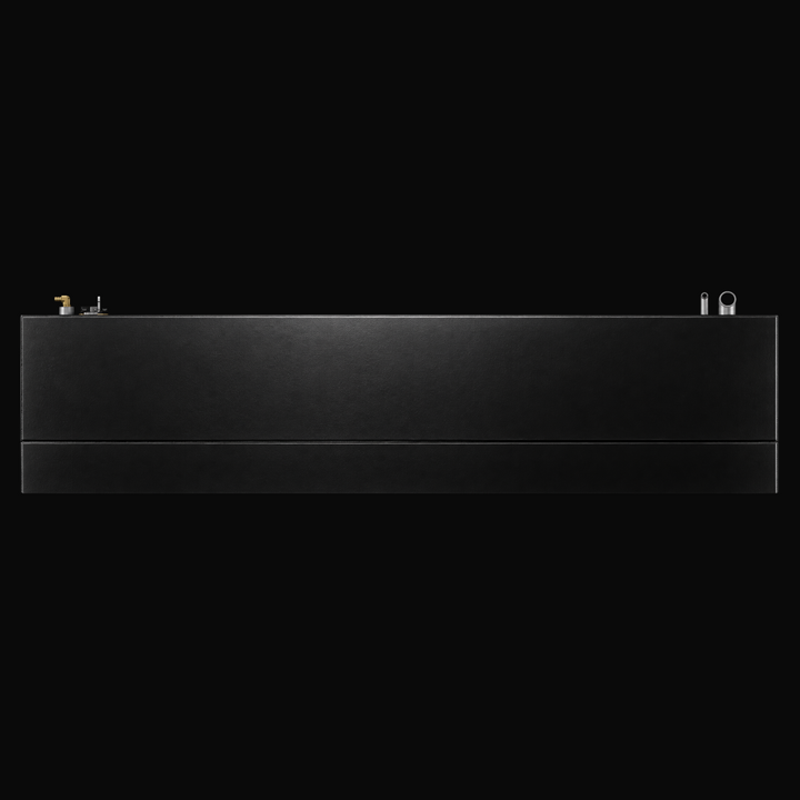A studio low-angle profile side view showcasing the long rectangular body, protective black TarGard epoxy coating, and top deck fittings of a finished Proline 23 WA replacement marine fuel tank (140 gal) from file image_7d3cc9.jpg against a black background. Fabricated by Welding World in Miami, FL from heavy-gauge marine-grade aluminum, the side elevation highlights precision placement of fill necks, vent assemblies, and pickup/sending units engineered for a 100% direct drop-in fit.