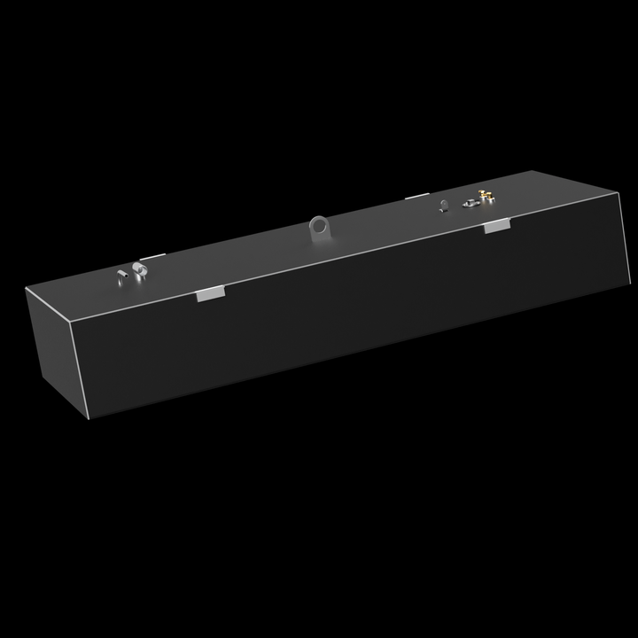 A dark grey, elongated rectangular fuel tank with various golden and silver-colored fittings on its top surface, including pipes, valves, and a large circular opening. White brackets are visible along the long sides of the tank. The tank is positioned against a black background with subtle white dots