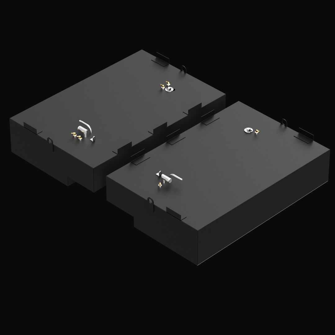 3D rendered image of a Pursuit 3000 1998 Saddle Tank Combo. The setup features two large rectangular black fuel tanks, each with multiple mounting brackets and fittings on the top surface. Both tanks have matte black finishes, with metallic pipe fittings, connectors, and lift rings visible. The tanks are positioned side-by-side with a slight gap between them, set against a black background and viewed from a slightly elevated angled perspective