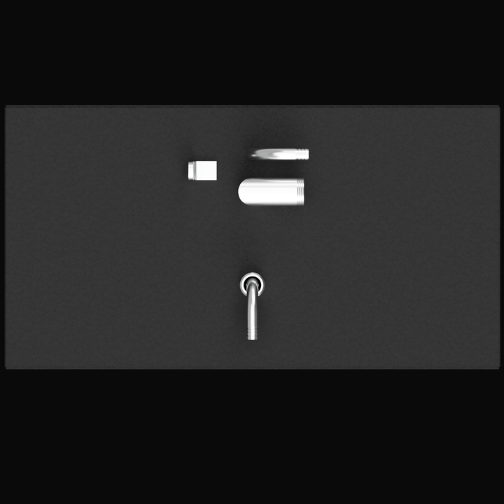 A top-down close-up view of the fittings on a dark surface. Fittings include a small rectangular piece, a horizontal silver cylinder, a flat silver disc, and a large silver L-shaped component with a ring