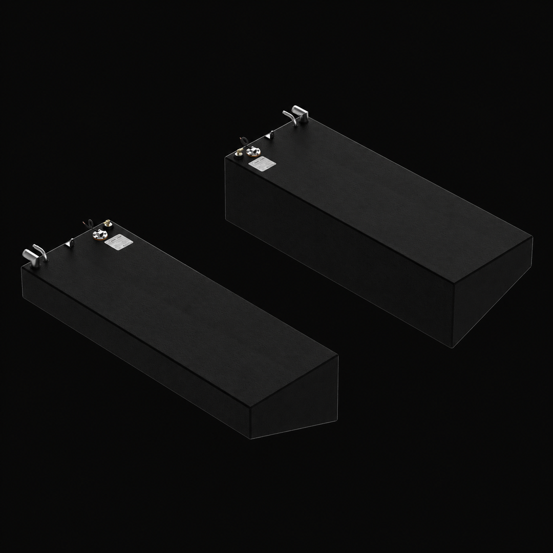 A reversed high-angle isometric perspective view of a black Rinker Fiesta Vee 280 saddle fuel tank 2-tank combo system. This matched pair of port and starboard replacement fuel cells highlights their asymmetric wedge-shaped angled bottoms, precision-engineered by Welding World to align flush against the outboard hull lines of the vessel. Fabricated from heavy-gauge marine-grade 5052-H32 aluminum, both tanks are fully encapsulated in a protective black TarGard epoxy coating to resist bilge corrosion. The top