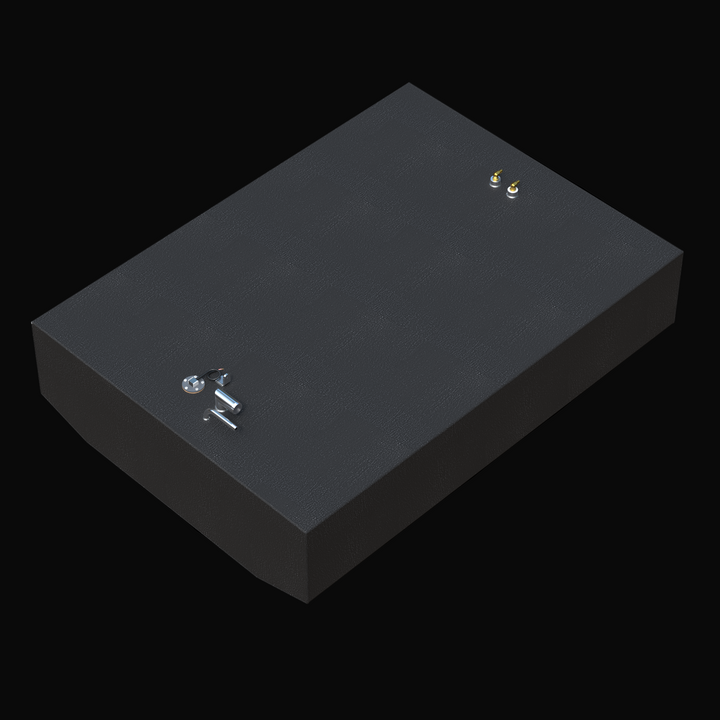 This image shows a 3D rendering of a rectangular boat fuel tank with a black textured finish. The tank has several metal fittings and attachments on its top surface, including two brass-colored valves or connectors at one corner and a circular metal plate with an additional fitting near another corner. The tank has a simple, functional design without visible branding or labels and is shown against a solid black background. The design appears sturdy
