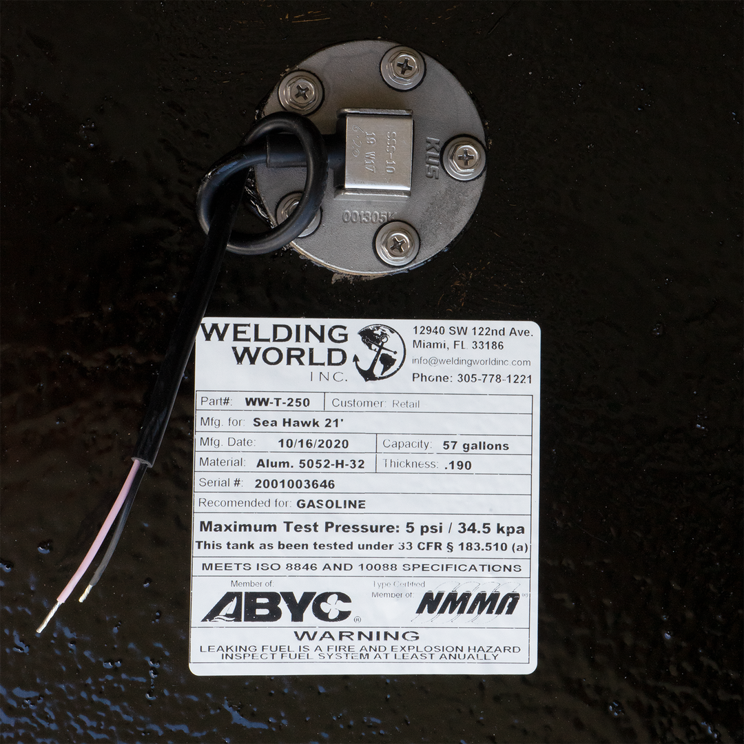Detail of a Sea Hawk 21' fuel tank label by Welding World INC, displaying specifications, safety warnings, and a sending unit