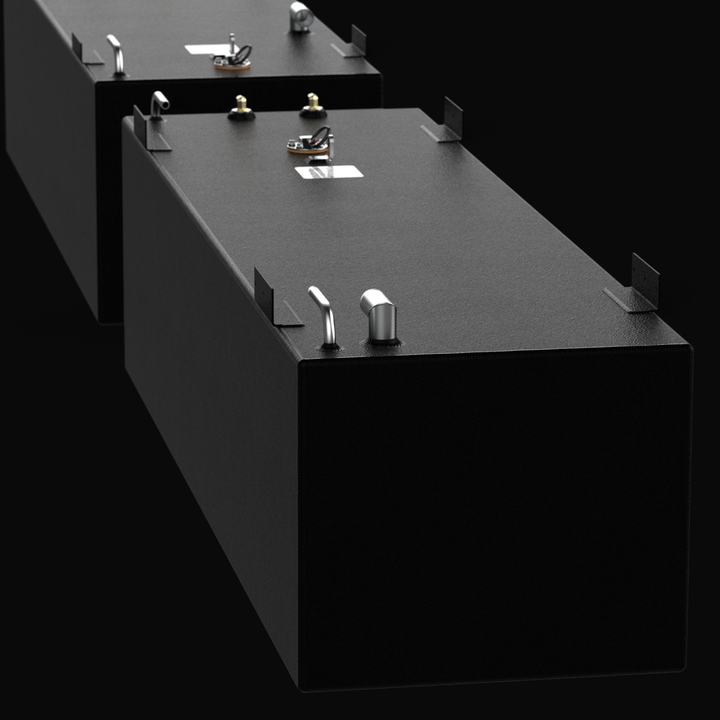 A low-angle inline perspective rendering of a black dual-tank fuel setup, showcasing a Sea Vee 29 OEM replacement marine fuel tank combo system. This view highlights both the front and back rectangular fuel cells positioned in a linear arrangement, masterfully constructed from heavy-gauge marine-grade 5052-H32 aluminum and fully encapsulated in a textured black TarGard epoxy coating for maximum corrosion resistance. The upper decks feature pre-installed marine hardware including a 90-degree fuel fill pipe, 