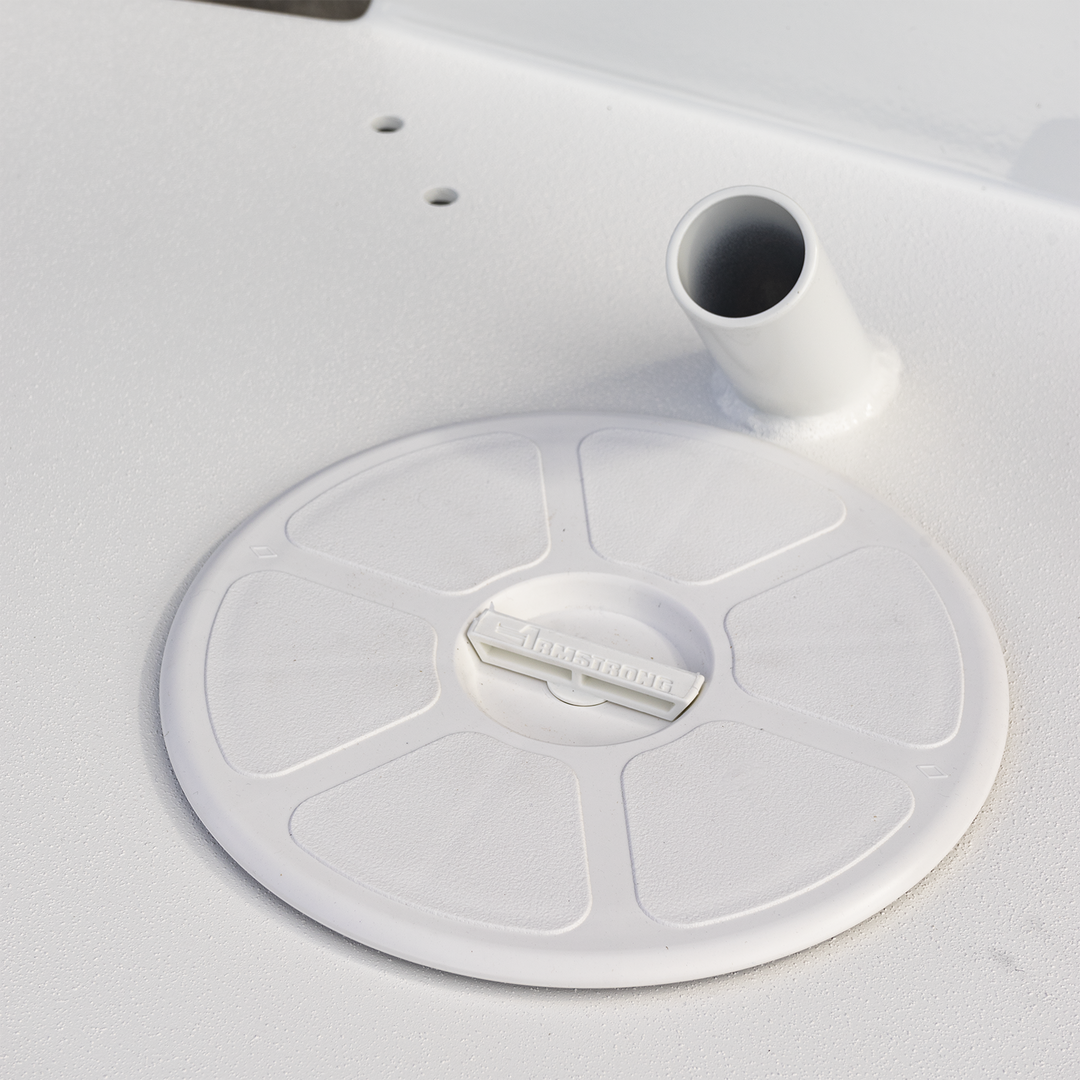 A close-up view of a Seacraft 23 Twin Engine High Flotation Bracket, featuring a circular base with three mounting holes and a central opening, designed for enhanced stability and support for twin engines on a boat. The image is predominantly bright, with a white background