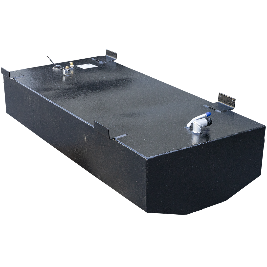 A black, rectangular fuel tank with a textured surface, featuring a rounded front edge. Various metal fittings and connection points are visible on the top surface, along with some attached metal brackets