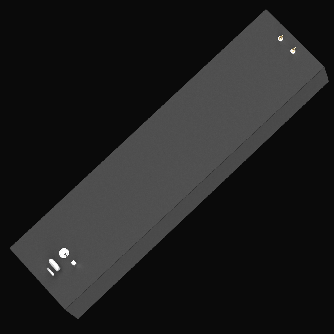 A 3D rendered model of a long, rectangular black marine fuel tank with beveled front corners, viewed from a high angle above the rear-right side. The tank features several fittings on its top surface, including two small brass fittings near the rear-right corner and multiple silver pipe components and caps near the front-left corner. The tank has a smooth matte black finish and is displayed on a plain black background