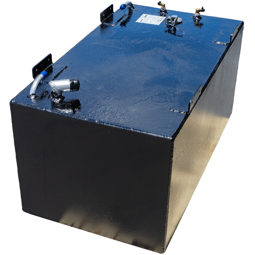 A black rectangular fuel tank, possibly a SeaVee 29' 2003 front fuel tank, is displayed against a checkerboard transparent background. The top surface of the tank has a textured appearance and features several metal fittings, including a pipe with a blue cap, two brass-colored connectors, a circular cap with a pull tab and wires, and a cylindrical pipe. Mounting brackets are also visible along the edges