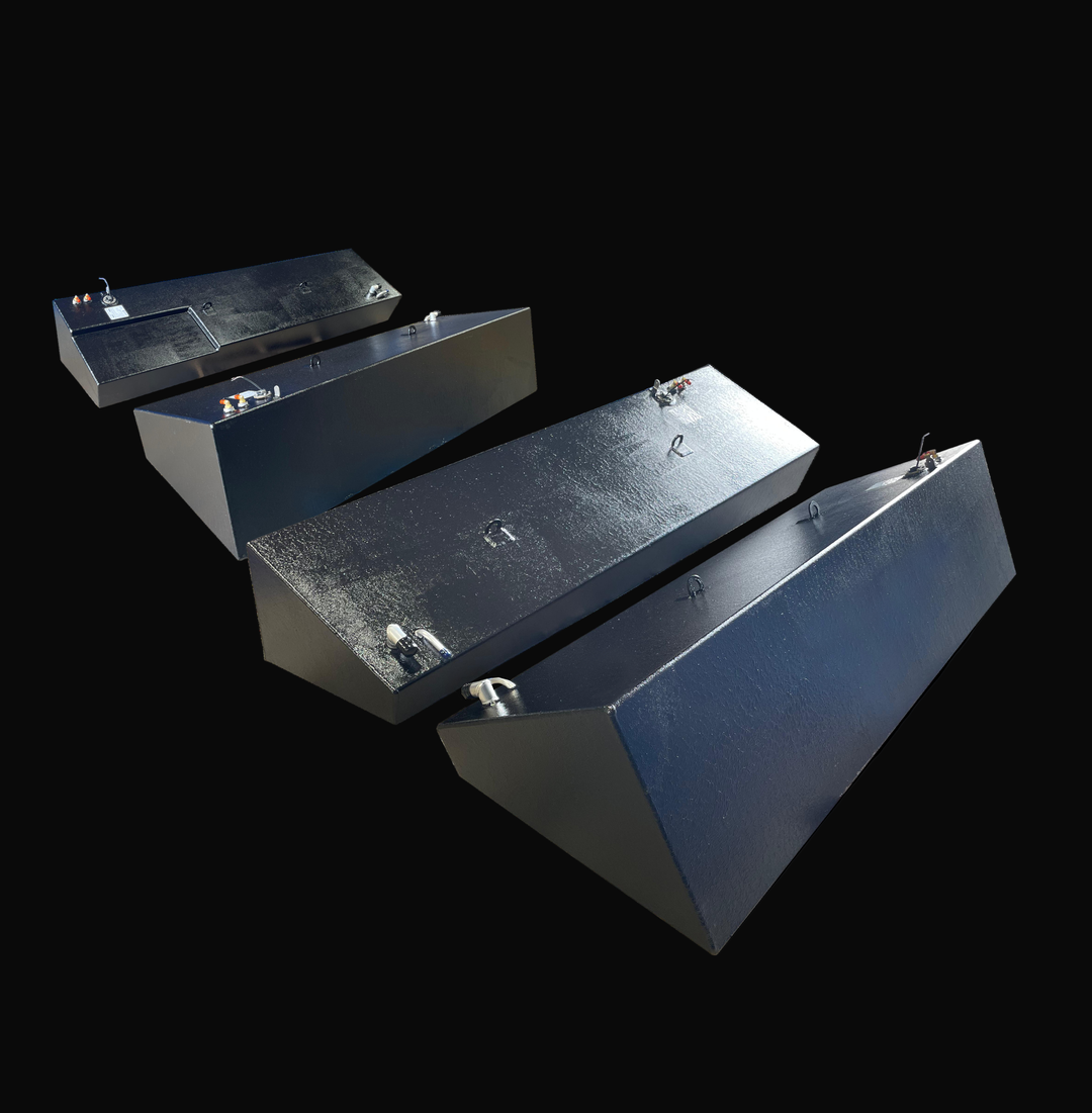A photo of the SeaVee 4-Tank Combo (FWD Port & STBD / AFT Port & STBD) 39' Built to OEM Specs, showing all four dark, textured tanks arranged diagonally against a black background.