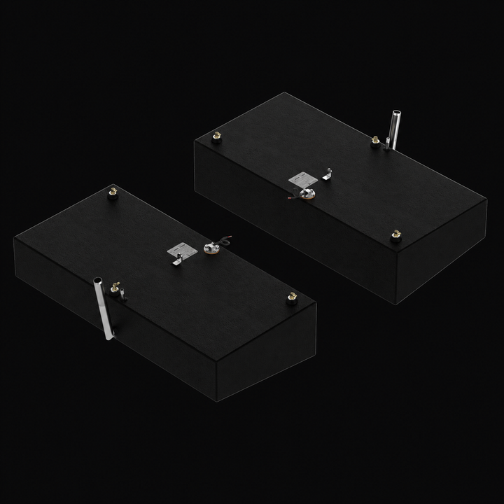 A high-angle isometric perspective view of a pair of black Shamrock 25-9 Saddle (2-tank combo) replacement marine fuel tanks from file image_7351de.jpg, isolated against a black background. This alternative top-down angle showcases the mirrored port and starboard 52-gallon outboard fuel cells arranged parallel to one another. Precision-fabricated from heavy-gauge marine-grade 5052-H32 aluminum, the structural tanks are fully encapsulated in a protective, textured black TarGard epoxy coating to resist harsh 