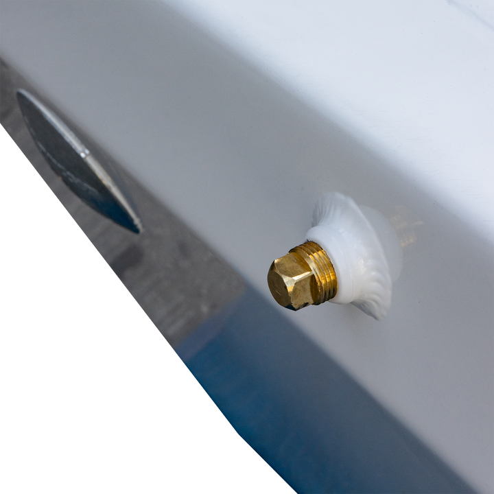 Close-up of a Standard Apex Mk. II Twin Engine Bracket featuring a -13° transom angle, showcasing a brass fitting with a white sealing washer against a smooth white surface.