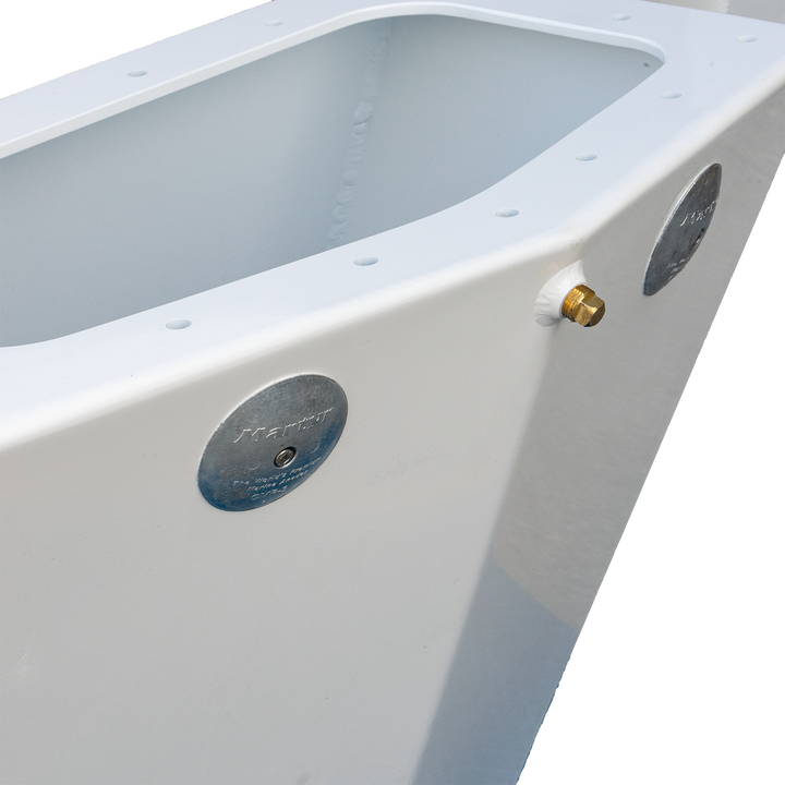 A close-up of a white boat transom with two circular metal plates and a small brass fitting protruding from the side. The interior of the transom is empty, and the background is a transparent checkered pattern