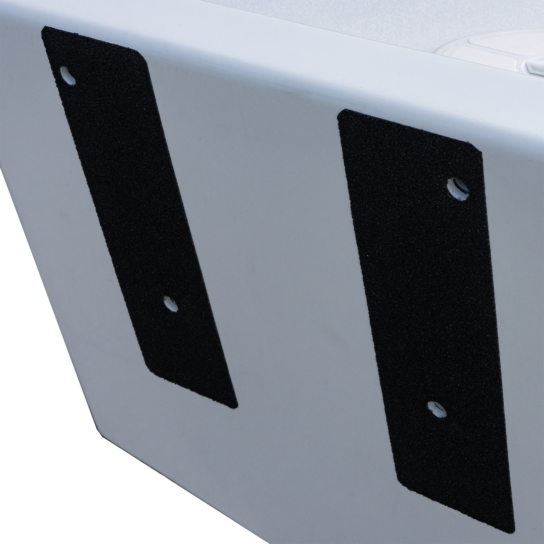A close-up of a white boat transom with two black mounting brackets attached vertically. Each bracket has two holes for screws or bolts, and they are positioned on opposite sides of the transom. The background is transparent