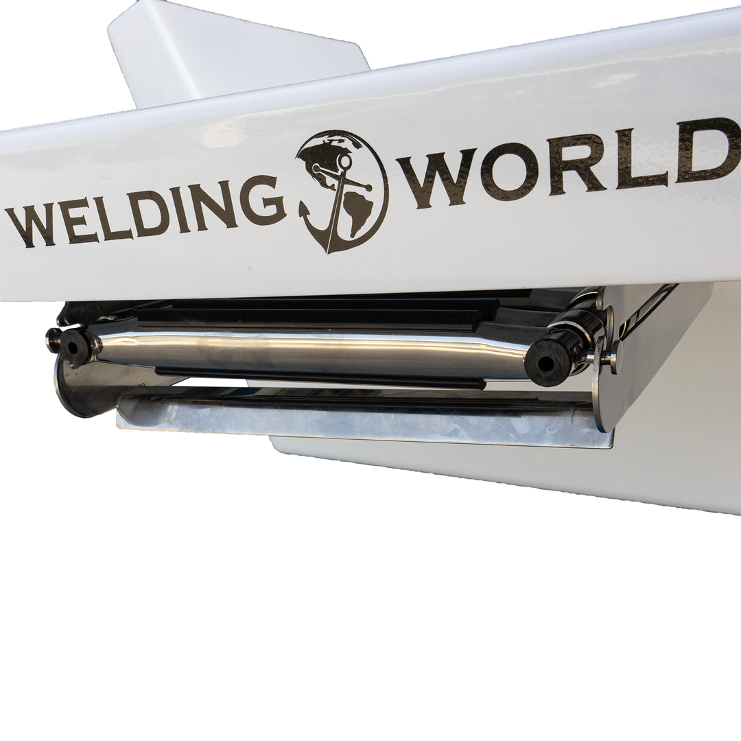 A close-up of a white boat transom with the logo and text "Welding World" printed on it. The logo features a globe with a welding helmet and a welding torch. The transom has a metal roller or support attached underneath. The background is transparent with a checkered pattern