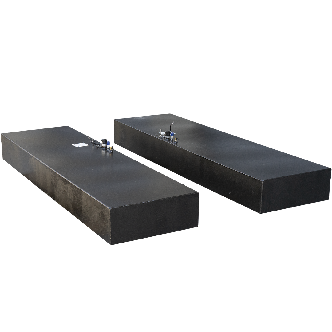 Two identical rectangular fuel tanks, each with a textured black finish, are shown against a checkered background. These are part of a Twin Vee 260 Plastic to Aluminum Conversion Saddle Fuel Tank Combo Kit, with each tank having a 75-gallon net capacity. Both tanks feature various fittings and connections on their top surfaces, including brass components, sensors with wires, and blue-capped vents