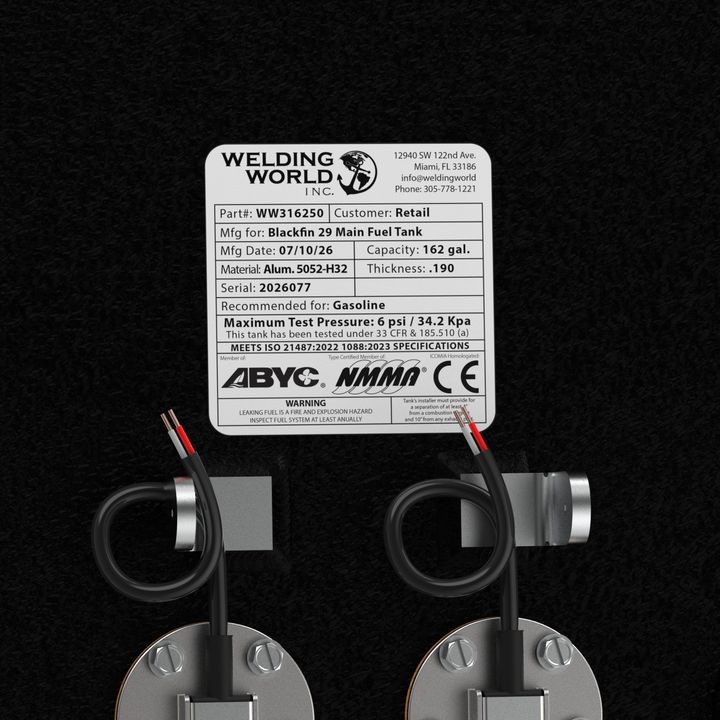 A close-up overhead rendering focusing on the official manufacturer specification placard, dual fuel level sending units, and fuel pickups on a black Blackfin 29 OEM replacement marine fuel tank from file image_a86902.jpg, isolated against a black background. The white weather-resistant data plate highlights precision engineering by Welding World Inc. in Miami, FL, explicitly listing Part Number WW316250, a 162-gallon capacity, heavy-gauge marine-grade 5052-H32 aluminum material construction with a 0.190-in