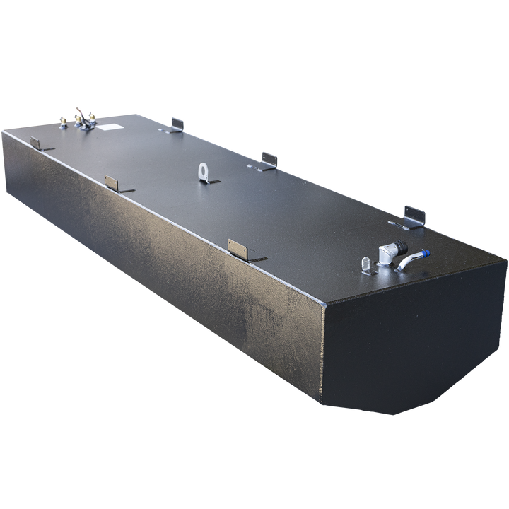 Large black metal fuel tank with multiple mounting tabs along the sides and fittings on the top surface. The tank has a rounded front edge and appears sturdy with visible weld seams. The background is transparent, showing only the tank from a slight angled perspective