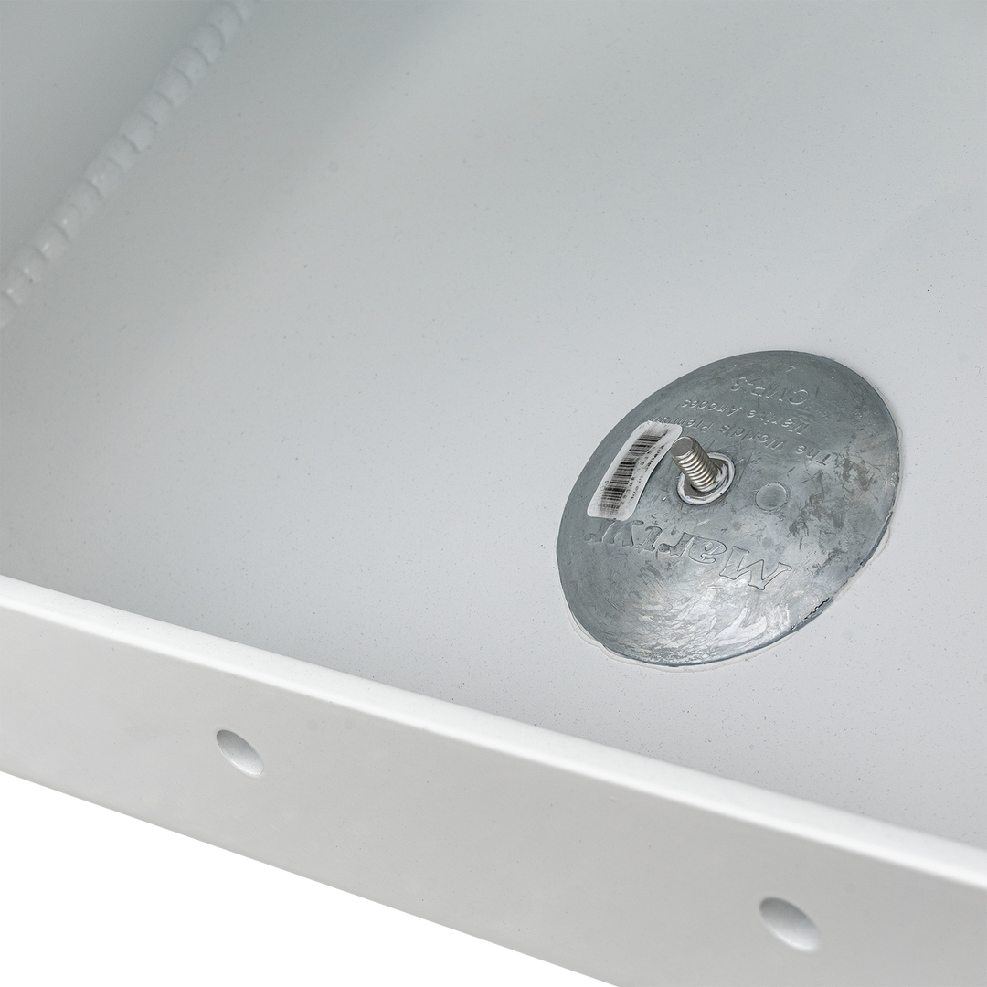 Close-up of the Whitewater/Seavee/Rampone 25 Twin Engine High Flotation Bracket, showing a metallic support plate with a bolt and barcode sticker attached. The surface is smooth and white, with a corner of the bracket visible at the bottom. The background is transparent