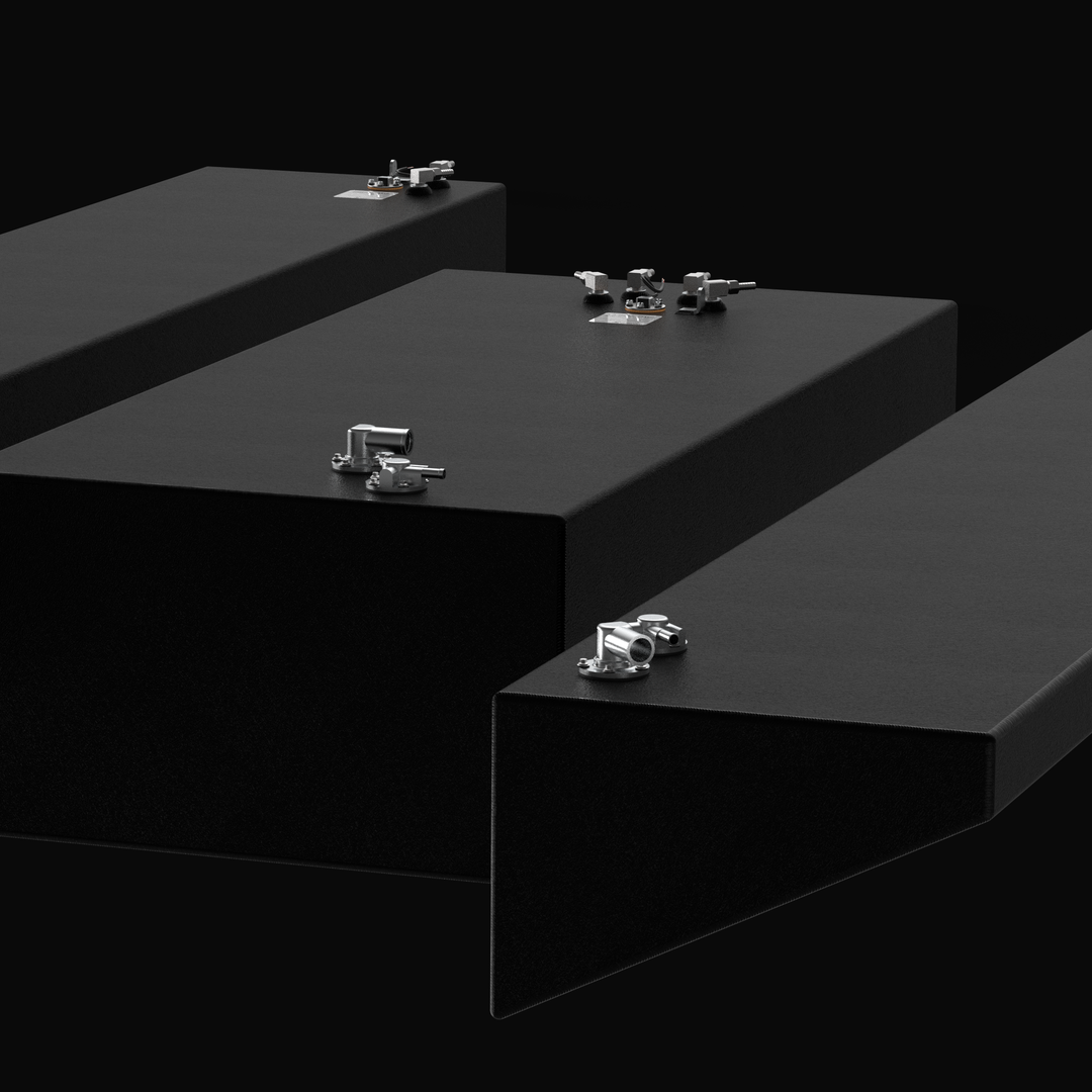 Close-up technical render of a complete Yellowfin 42 replacement fuel tank system in a professional black Coal Tar Epoxy finish. The image displays the 250-gallon center tank and dual 163-gallon wing tanks with their custom-tapered hull profiles. Highlighted are the precision 316 stainless steel pickup tubes and EPA-compliant fittings, all engineered for a 100% guaranteed OEM fit on 2013 flagship models.