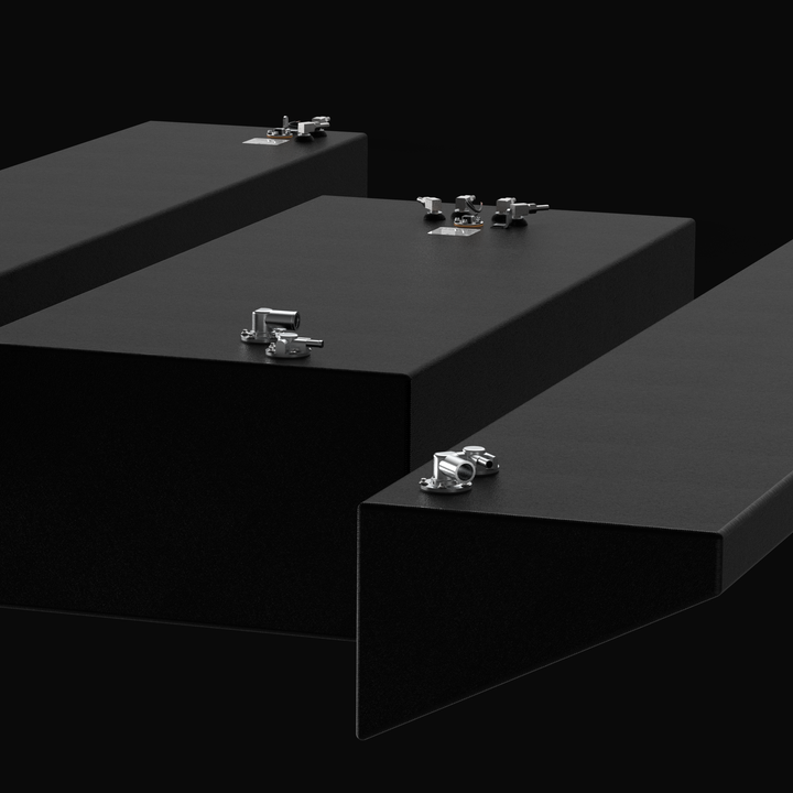 Close-up technical render of a complete Yellowfin 42 replacement fuel tank system in a professional black Coal Tar Epoxy finish. The image displays the 250-gallon center tank and dual 163-gallon wing tanks with their custom-tapered hull profiles. Highlighted are the precision 316 stainless steel pickup tubes and EPA-compliant fittings, all engineered for a 100% guaranteed OEM fit on 2013 flagship models.