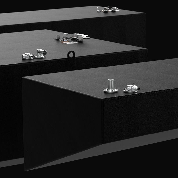 Low-angle wide-perspective 3D rendering of the center tank and twin saddle tanks for a Yellowfin 54, showcasing the hull-matching tapered profiles and coal-tar epoxy corrosion protection.